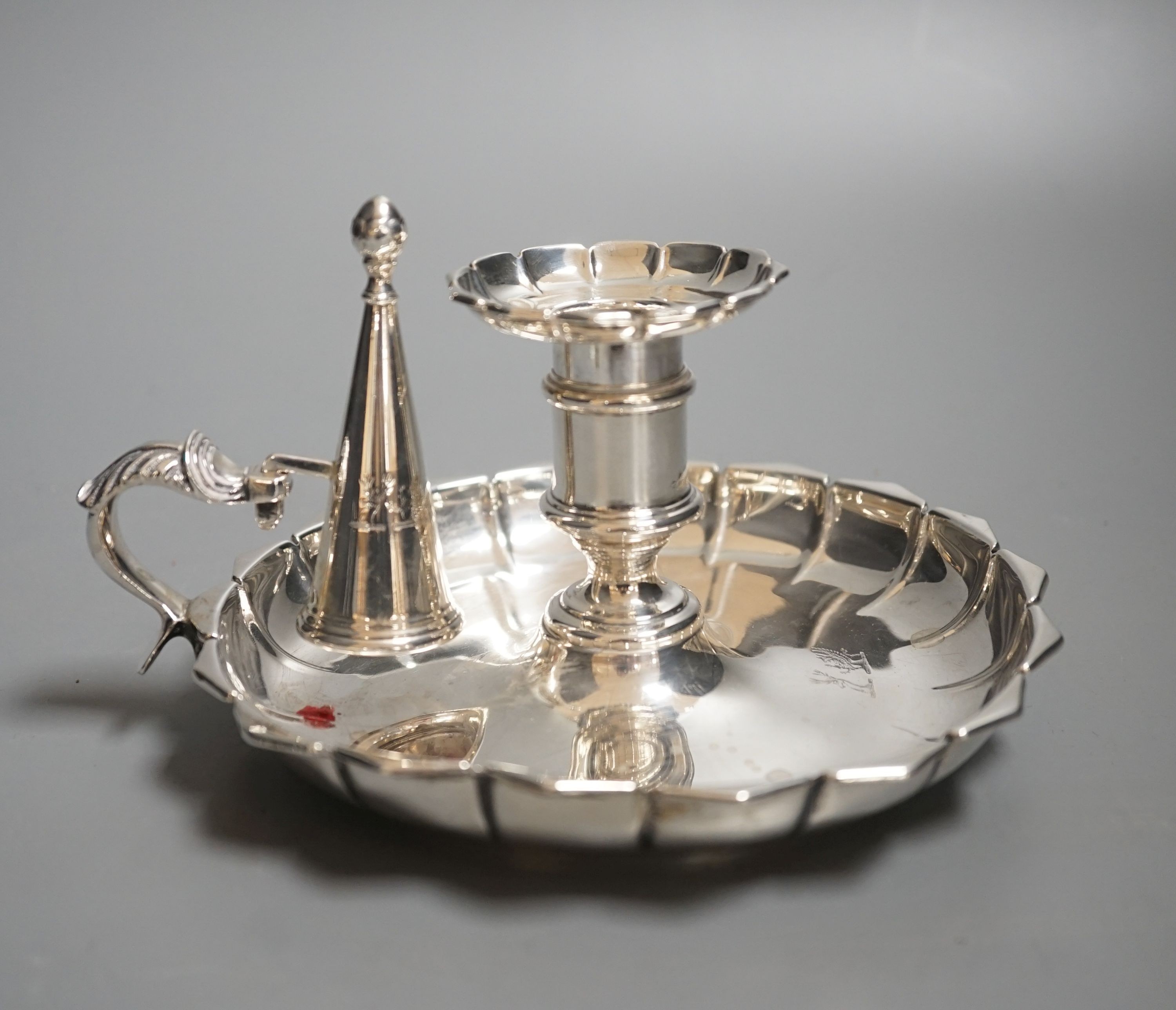 A William IV silver chamberstick, by Robinson, Edkins & Aston, Birmingham, 1835, 16.2cm, in diameter, 11oz.